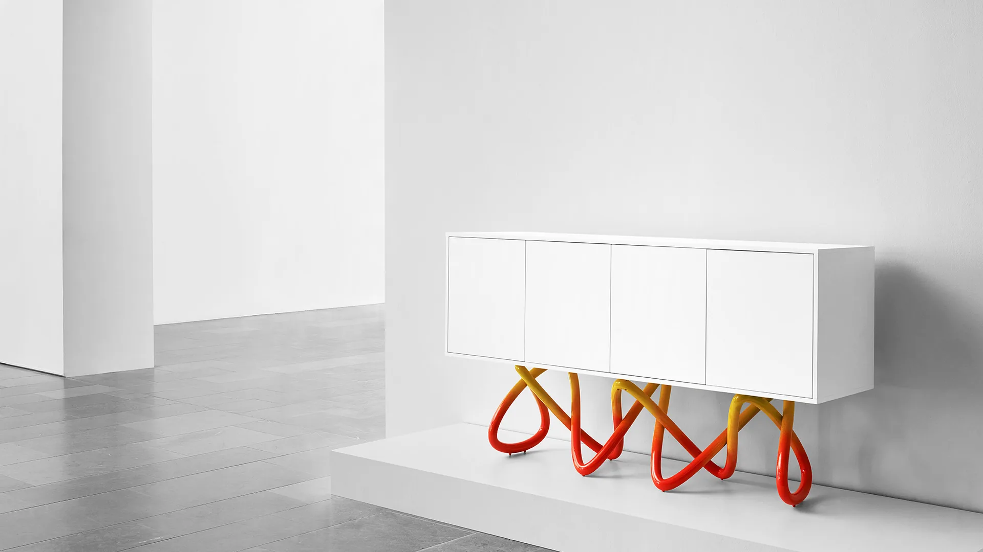 Marcam Cabinet with sculptural red and yellow legs
